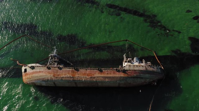 Aerial drone flight over shipwreck of Delfi in Black sea with panorama at Odessa coast, Ukraine, 4K