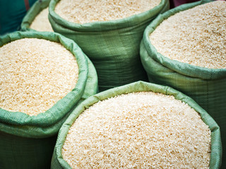 Rice for sale at the asian market. Organic food background