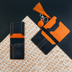 Black and orange stylish leather purse for driver's license, passport or id card. Documents cover...