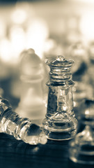 Chess piece on chessboard, competition success and strategy game play, vintage color tone process with blurred   background, Traditional holiday games