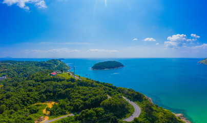 Ya Nui beach and Promthep Cape Viewpoint, Phuket island, Thailand. Aerial sea view with coral reefs, islands covered with jungle, beach with fine yellow sand. Paradise tropical landscape of Asia