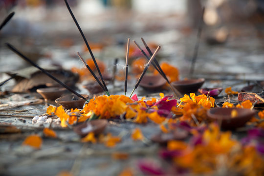 India, Uttar Pradesh, Allahabad, Kumbh Mela pilgrimage, Joss sticks and petals