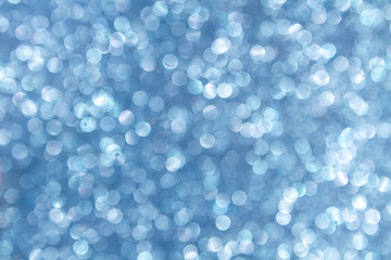 Blue bokeh background. Balls in defocus.