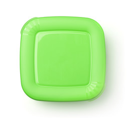 Top view of plastic food container with green lid