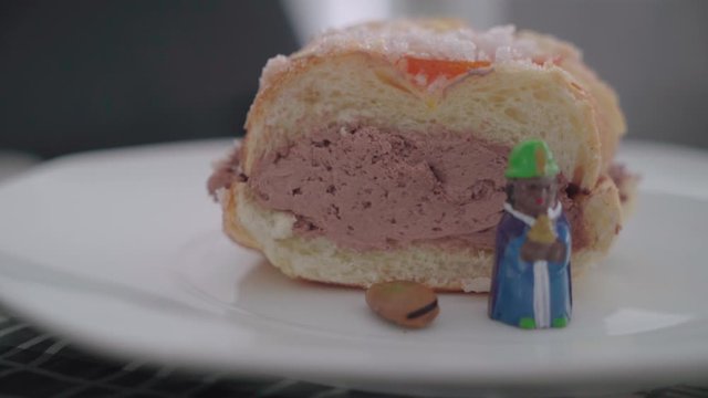 Traditional Spanish Roscon de Reyes Cake with Wise Man and Bean Figurines