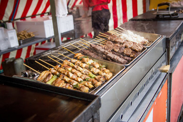 Street food shashlik barbecue. Bbq picnic in Japan.
