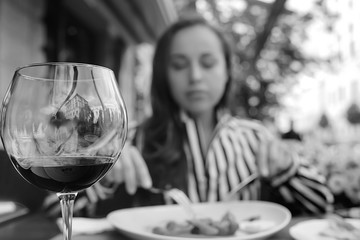 girl lunch cafe table portrait, beautiful brunette in the restaurant interior eats