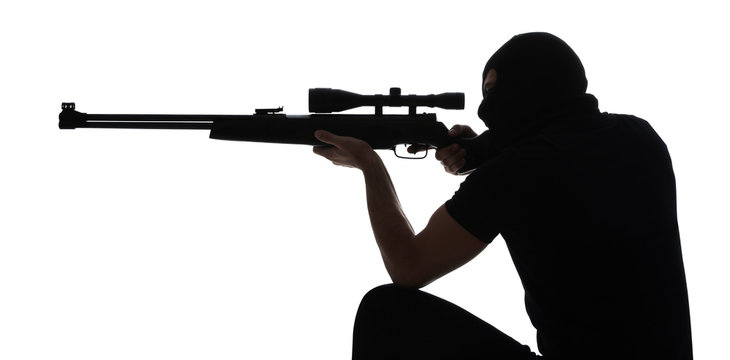 Professional killer with sniper rifle on white background