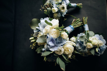  Beautiful bride's wedding bouquet with white and blue flowers. Top view