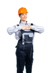 Girl construction engineer gesturing heartily congratulates with the purchase of real estate or quality repairs. Isolated
