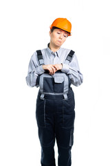 Female construction engineer is very saddened by her or someone else's work. Isolated