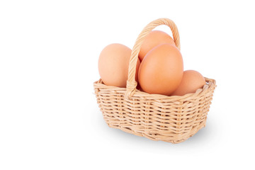 Eggs in a basket on a white background
