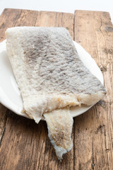 Slice of raw salted codfish