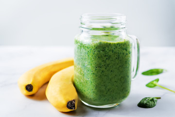Spinach banana smoothies in glass
