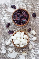 Different types of legumes - Cannellini Beans, Black and Red Kidney Beans, Lima and Pinto Beans had sorted in wooden bowls