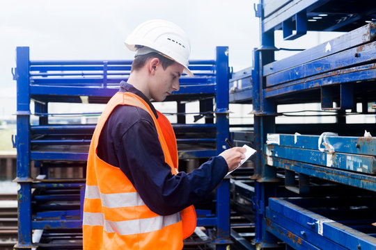 worker young male writing a protocol