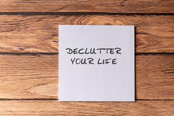 Declutter your life text on paper note - Business concept