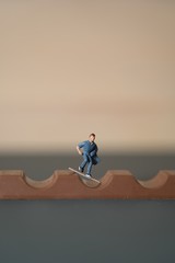 miniature skater in a chocolate bar halfipe. Skateboarder