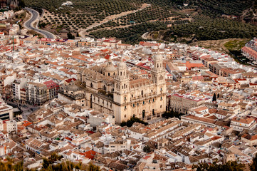 Fototapeta premium Panoramic view of the Cathedral of the Asuncion in Jaén Andalusia from the cross in Castle of Santa Catalina where you can see the city of Jaen and the neighborhood around the monument
