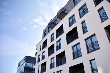 Modern and new apartment building. Multistoried, modern, new and stylish living block of flats.