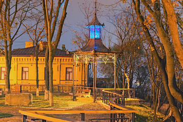 Night lights landscape of panoramic viewing platform with beautiful arbor. Artists Alley near the famous Andriyivskyy Descent. Famous Kyiv's landmark. Ukraine