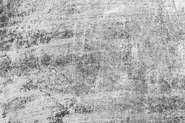 Texture of a concrete wall with cracks and scratches which can be used as a background