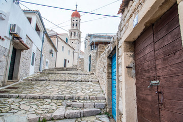 Narrow street in the fishing village, Murter, Croatia, Europe