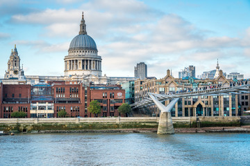 Fototapeta premium Sunny day embankment river Thames, Millennium Bridge, St. Paul's cathedral, City of London School. London, UK.