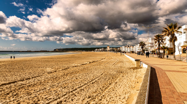 Panoramic view of the Spanish beach and ocean promenade of Barbate, Cadiz. 