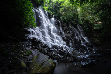  Beautiful scenic view of beautiful Kanto Lampo waterfall flowing on rock in long exposure. Jungle...