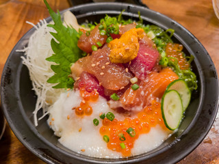 Close up shot of a bowl of fresh sashimi