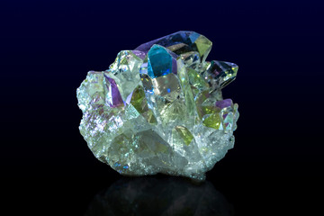 Titanium rainbow aura quartz crystal cluster.Close up