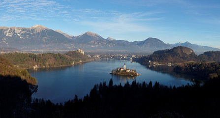 Elevated view of Lake Bled and the Church of Mary the Queen, located on a small island in the middle of the lake, Bled, Slovenia