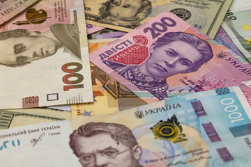 Closeup of dollar, euro and hryvnia banknotes 