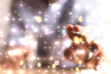 Businessman pressing document icon over computer binary code