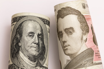 100 dollar and 1000 hryvnia banknote. Franklin and Vernadskyi confrontation