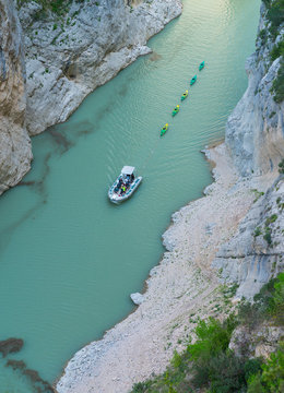 Electric boat, kayaks, Montrebei Gorge - Congost de Mont Rebei, Noguera Ribagorzana river, Montsec Range, The Pre-Pyrenees, Lleida, Catalonia, Spain, Europe