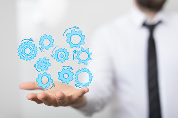 Business, Internet and technology concept. Business select gear icon on virtual screen.