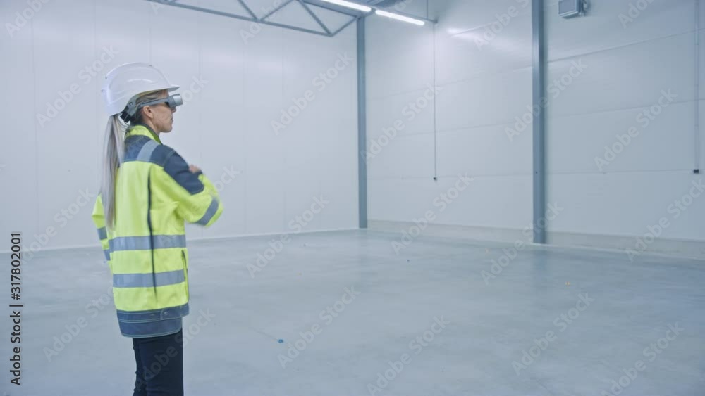 Poster industry 4.0 factory: female engineer wearing augmented reality headset uses mixed reality software,