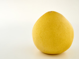 Fresh and juicy pomelo and its slices.Isolate on a white background