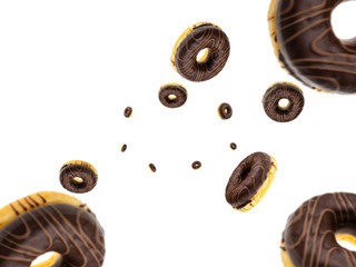 Round sweet doughnuts isolated on white. Fall background. Glazed sprinkles.