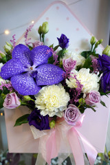 Exquisite composition of flowers in a gift box