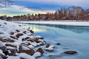 Cloudy Sunrise Over Bow River
