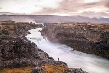 Woman in front of Detifoss in iceland