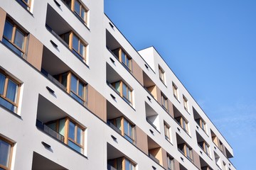 Modern and new apartment building. Multistoried, modern, new and stylish living block of flats.