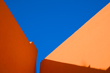 Minimalistic Architecture orange walls forming interesting basic shapes