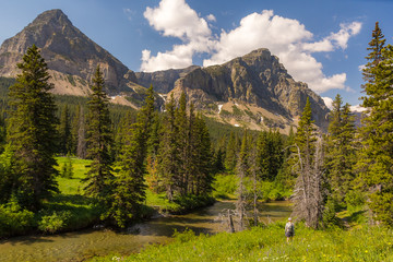 Young woman is hiking deep into the Wilderness of Montana