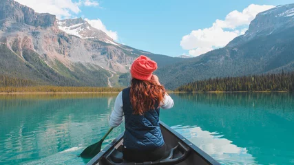 Wall murals Canada Kayaking around Emerald lake in Banff Canada