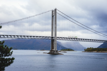 Classic Norwegian cold panoramic landscape of Efjorden fjord, Ballangen municipality, Nordland county, Ofoten district, Norway with Efjord Bridges, Stortinden mountain, Northern Norway