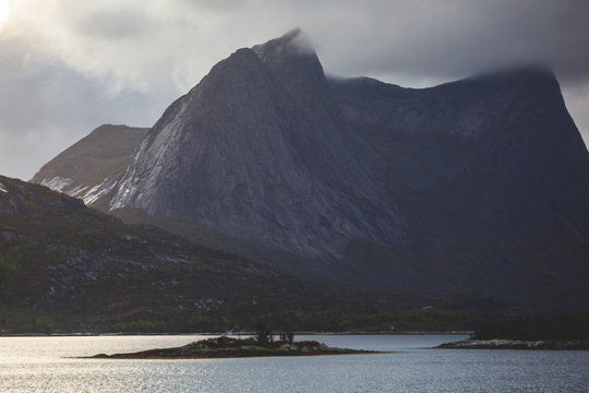 Classic Norwegian cold panoramic landscape of Efjorden fjord, Ballangen municipality, Nordland county, Ofoten district, Norway with Efjord Bridges, Stortinden mountain, Northern Norway